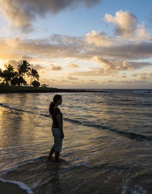 Enjoying a sunset on a beach in Kauai