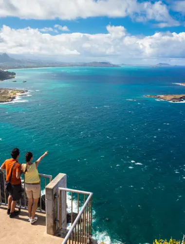 Visitors at a scenic overlook on the Windward Coast of O’ahu in Hawaii