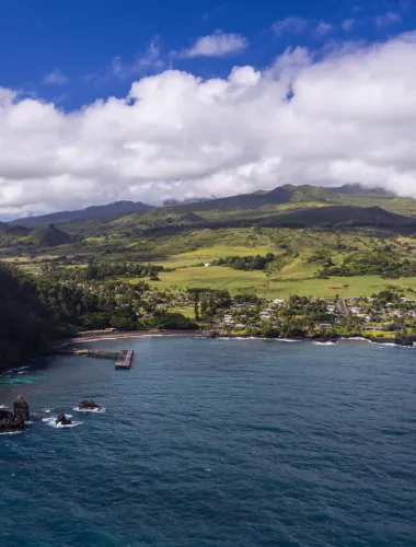 Couple biking along the coast of a resort near Hāna on Maui in Hawaiʻi