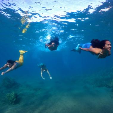 Mermaid swimming in Maui