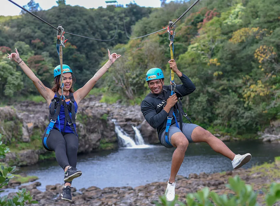 Travelers ziplining at the Lānaʻi Adventure Park on Lānaʻi in Hawaiʻi